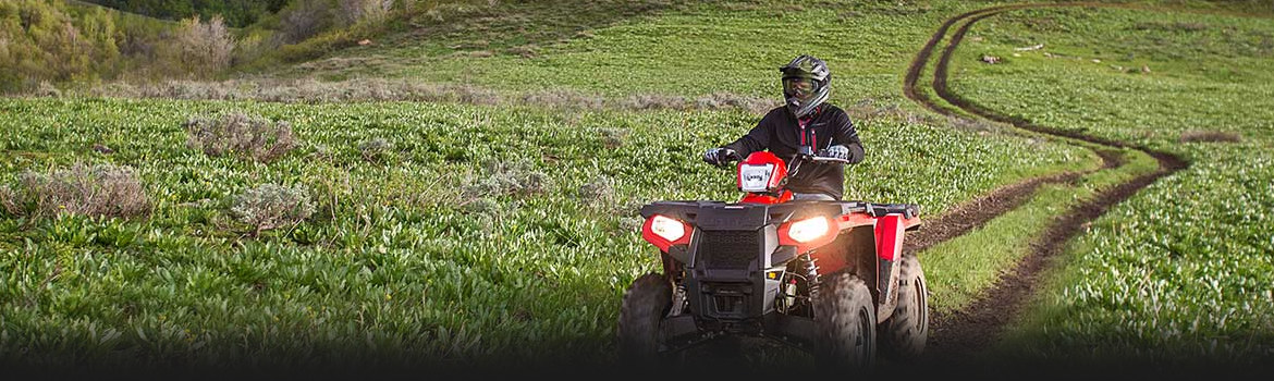2017 Polaris Sportsman in a countryside | Awards Banner